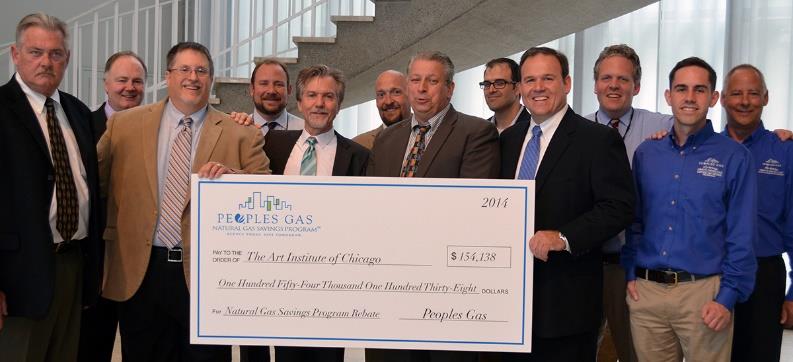 Art Institute of Chicago and project partners holding the natural gas savings rebate check
