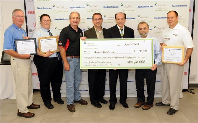 Berner Foods and project partners at the natural gas savings rebate check presentation
